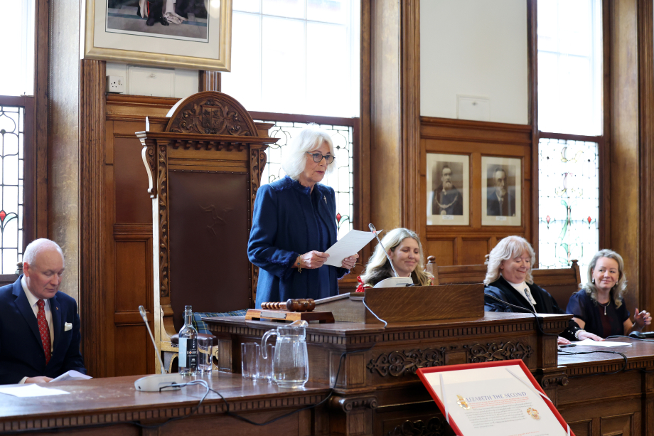 Queen Camilla delivers a speech on behalf of King Charles III during a visit to Douglas Borough Council on the Isle of Man.